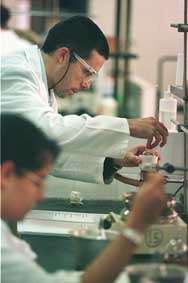 Working at a laboratory.